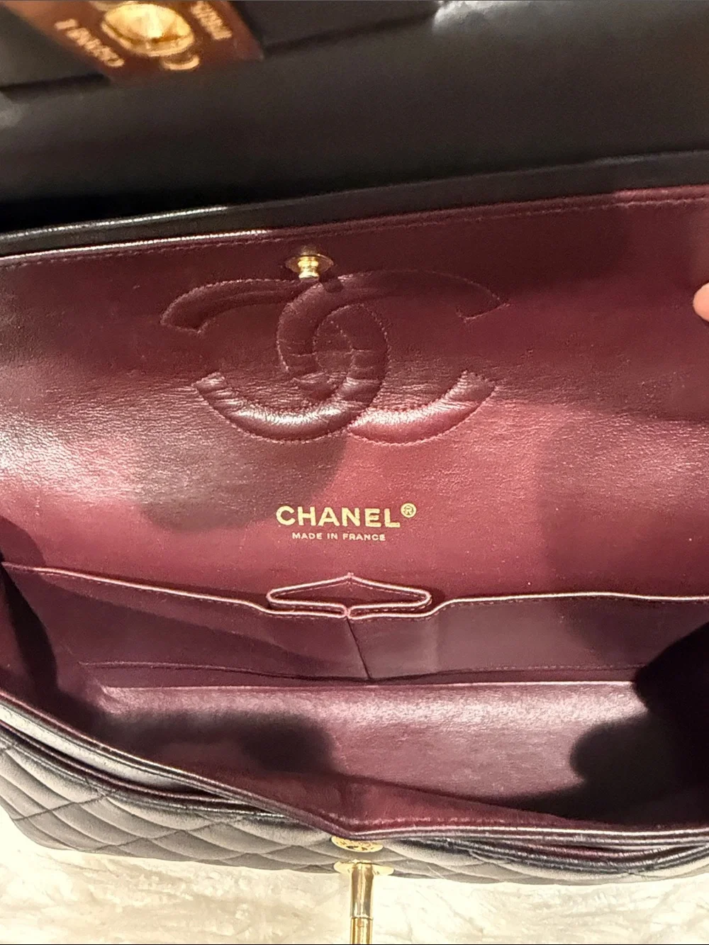 CHANEL Black Quilted Shoulder Bag with Gold Chain